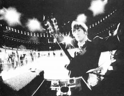 John Lennon snaps a picture during the Beatles' final live performance (August 29th, 1966)